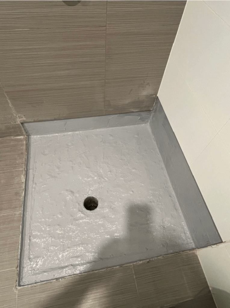 Shower waterproofing completed to prevent leaks and water damage